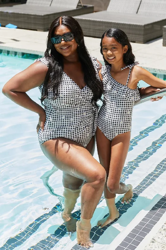 Marina West Swim Plus Size Float On Ruffle Faux Wrap One-Piece in Black Mother Daughter Swimwear Marina West Swim Plus Size Float On Ruffle Faux Wrap One-Piece in Black Mother Daughter Swimwear